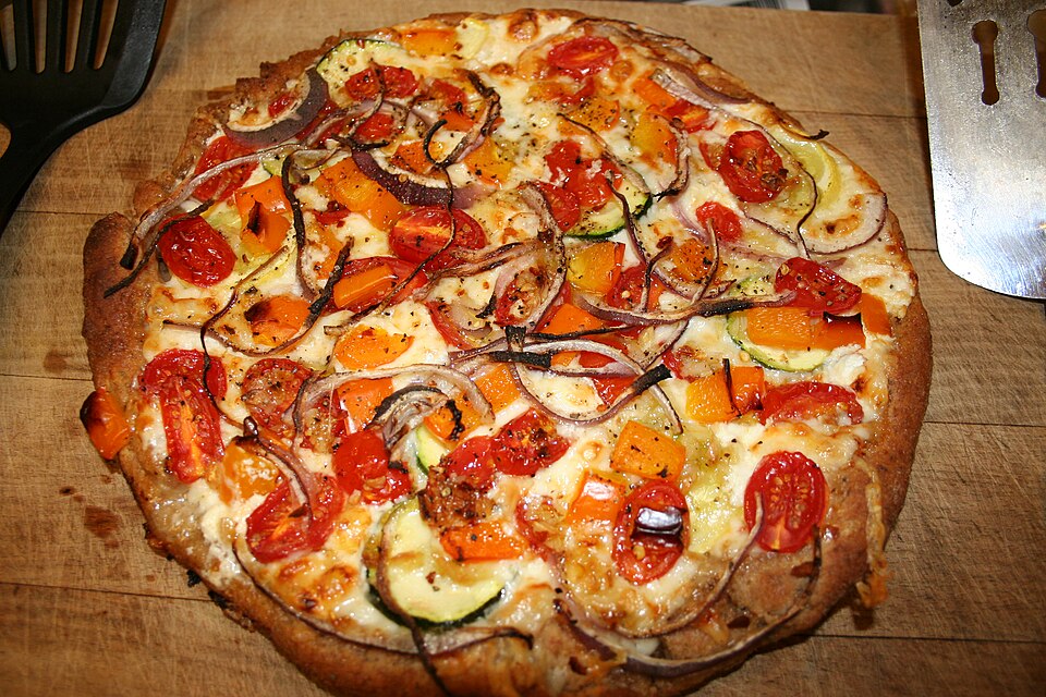 Vegetable pizza with tomatoes and peppers